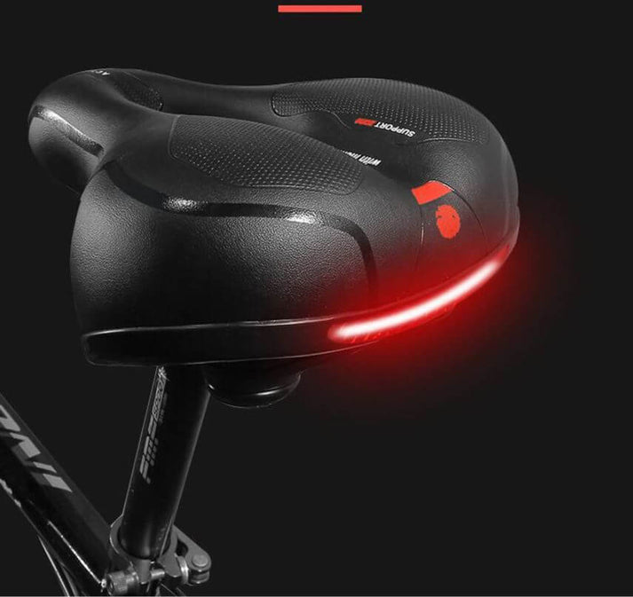 Bequemer Fahrradsattel mit LED-Rücklicht • Extra breite, stoßdämpfende Sattelkomfort